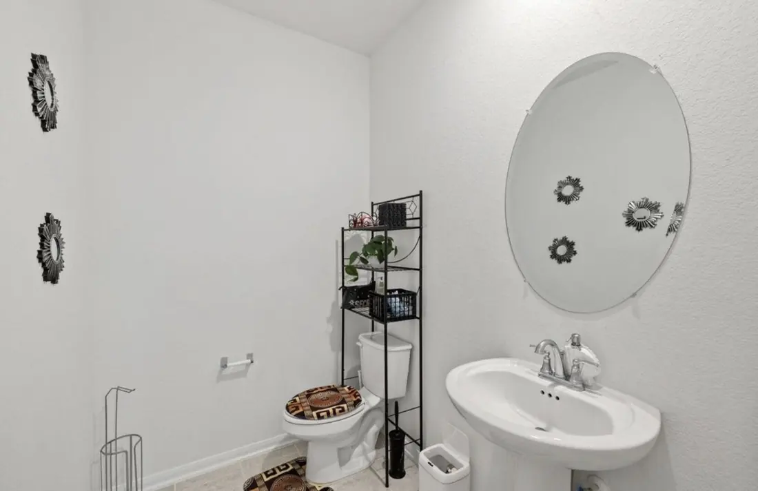 Half bath with a pedestal sink