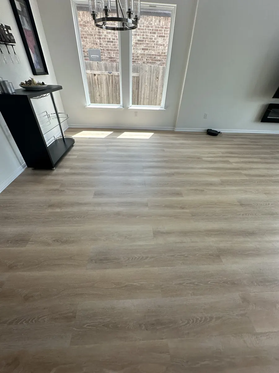 Dining area with new vinyl plank flooring