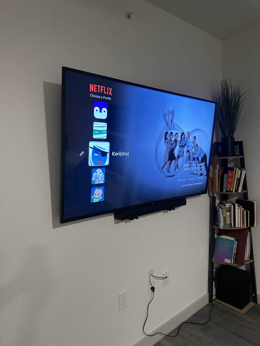 Finished TV mount with streaming apps set up and wires hidden